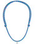 Blue paracord necklace with a white diamond charm on a white background