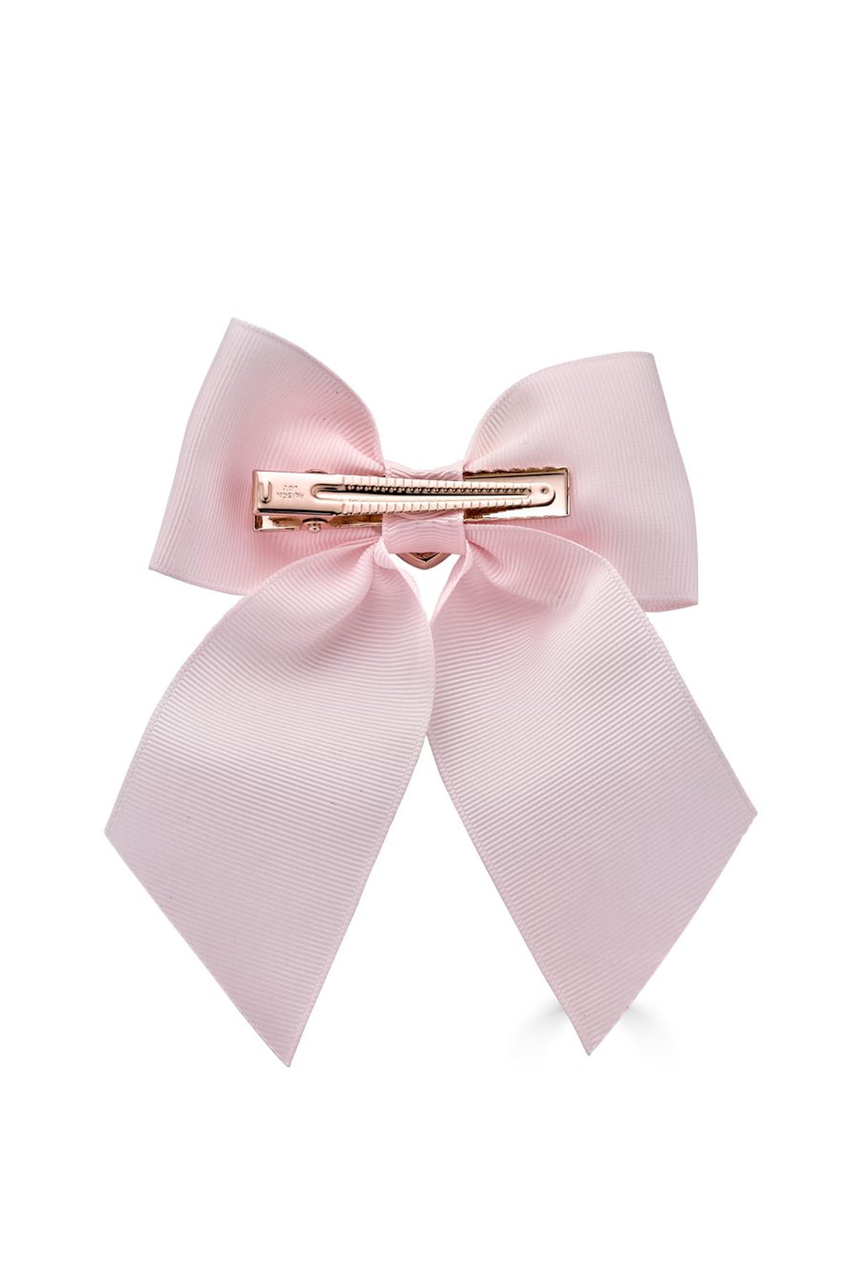 Pink hair bow with gold barette against a white background