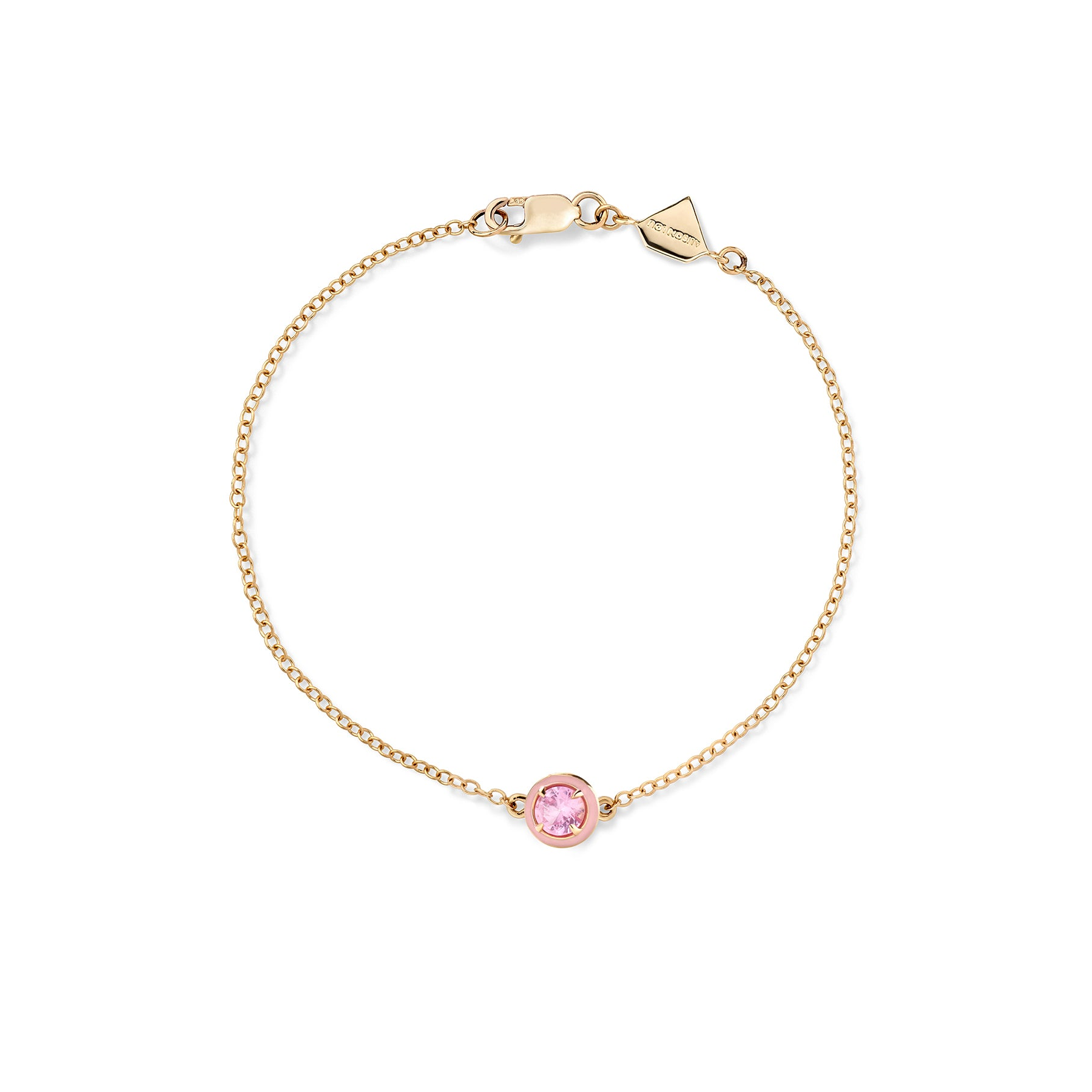 Pink Sapphire | A gold bracelet with a single round lab-created pink gemstone and two-tone enamel.
