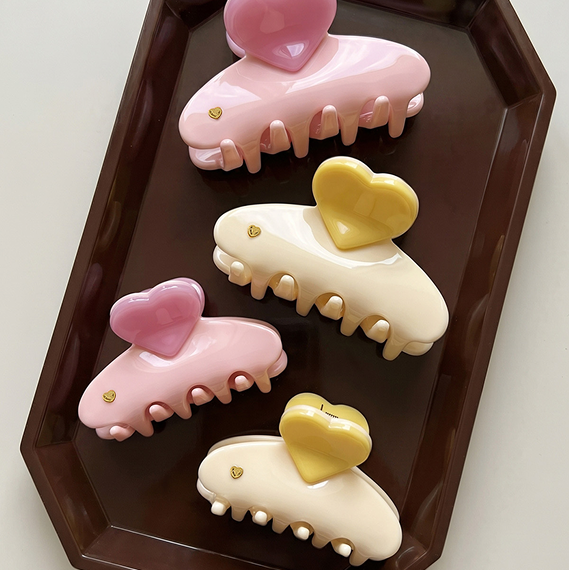 Jelly Hair Clips laying against a brown tray