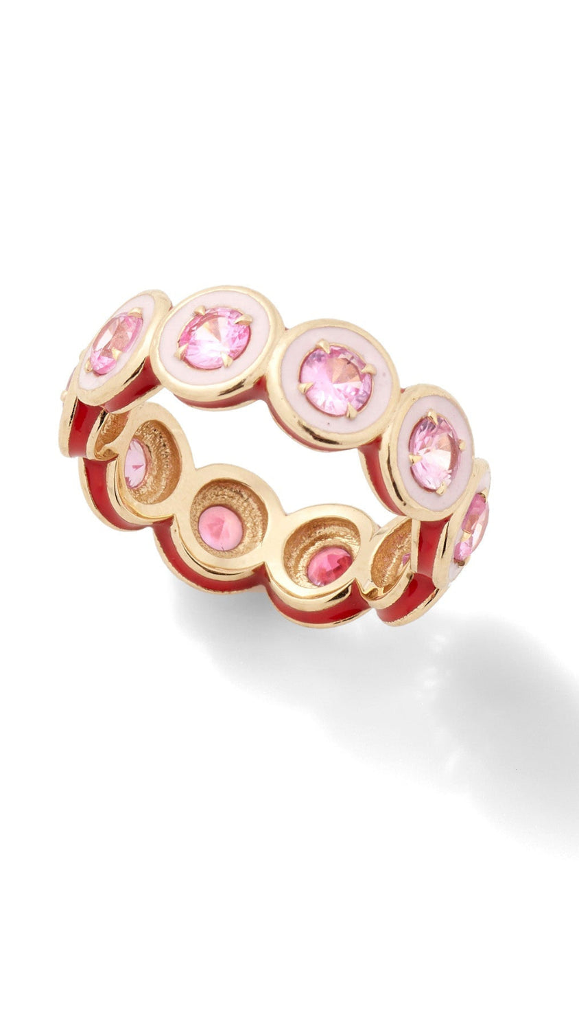 Gold ring with pink gemstones on a white background
