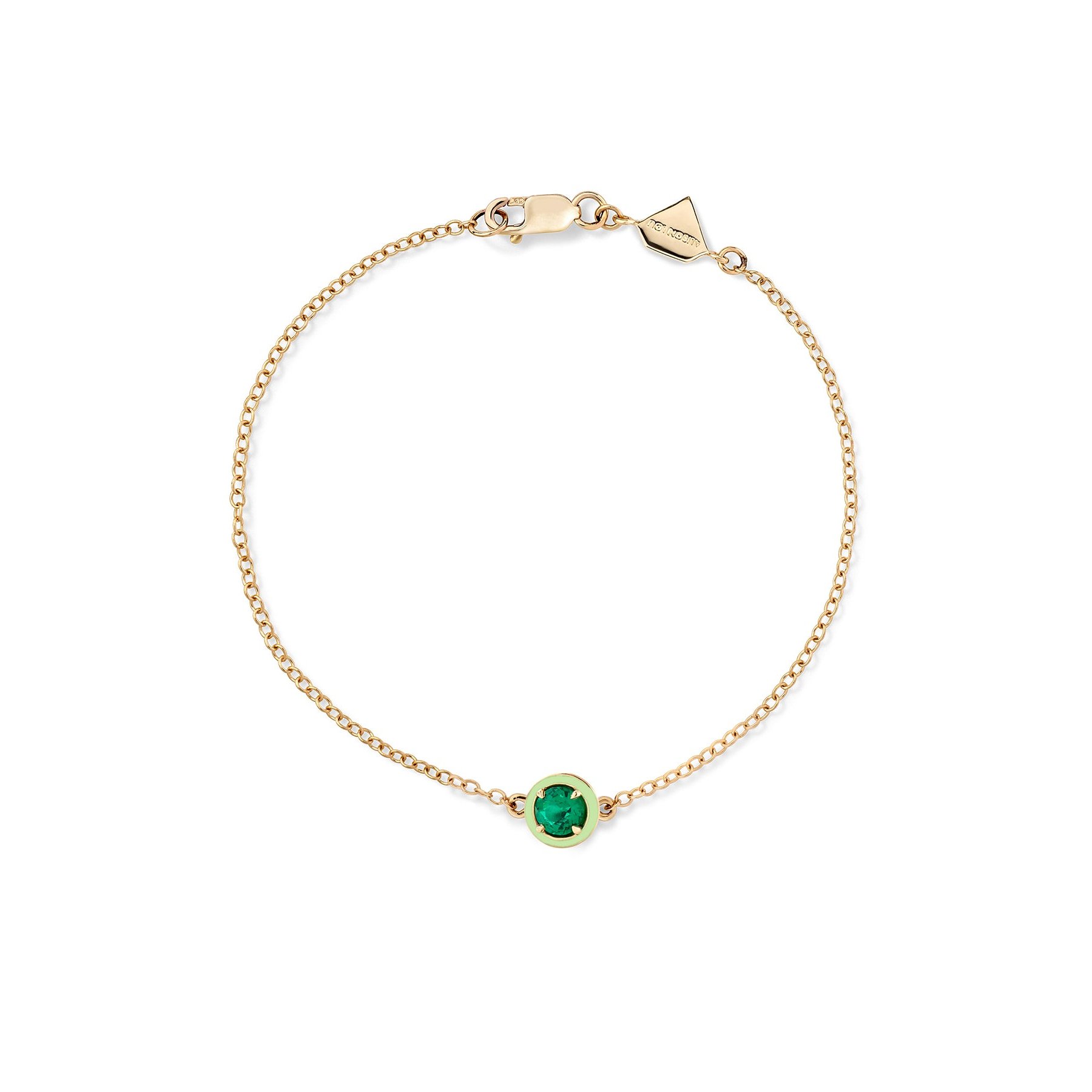 Emerald | A gold bracelet with a single round lab-created gemstone and two-tone enamel.