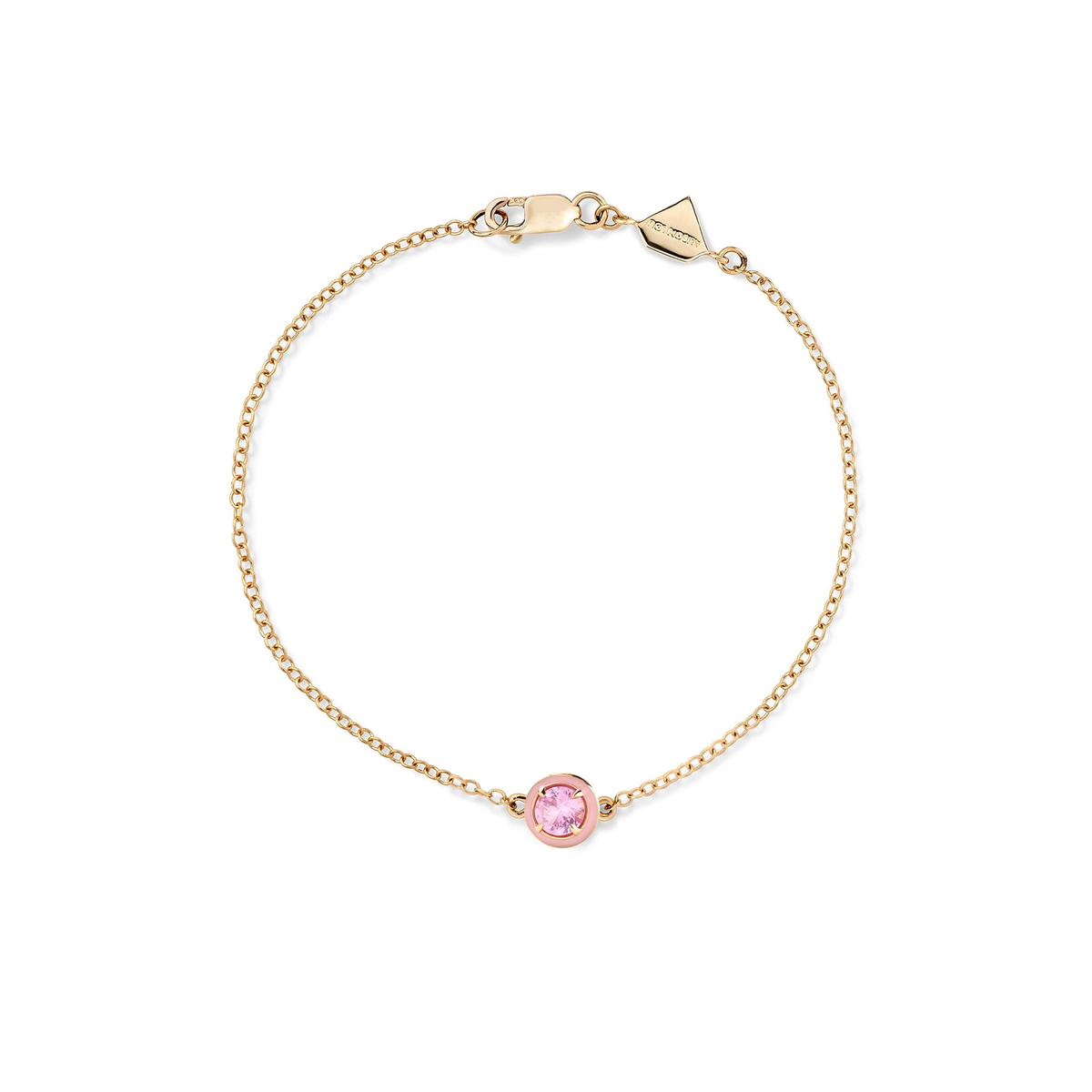 Pink Sapphire | A gold bracelet with a single round lab-created pink gemstone and two-tone enamel.